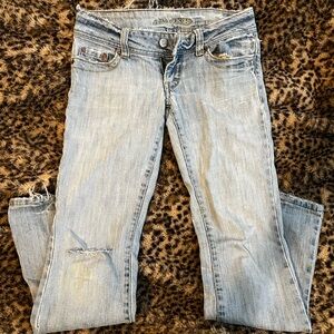 american eagle vintage y2k light blue wash distressed flare low rise jeans